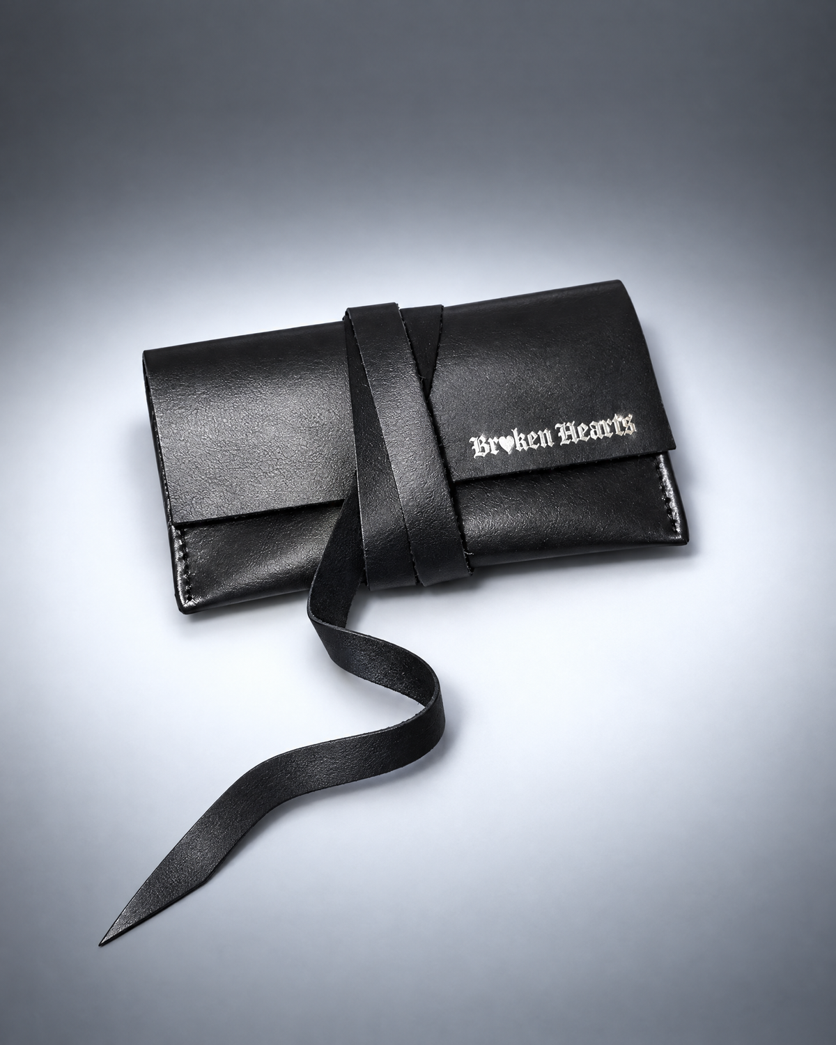 LIMEN: the BROKEN HEARTS bag in black full-grain calfskin, cut and sewn by hand in Italy