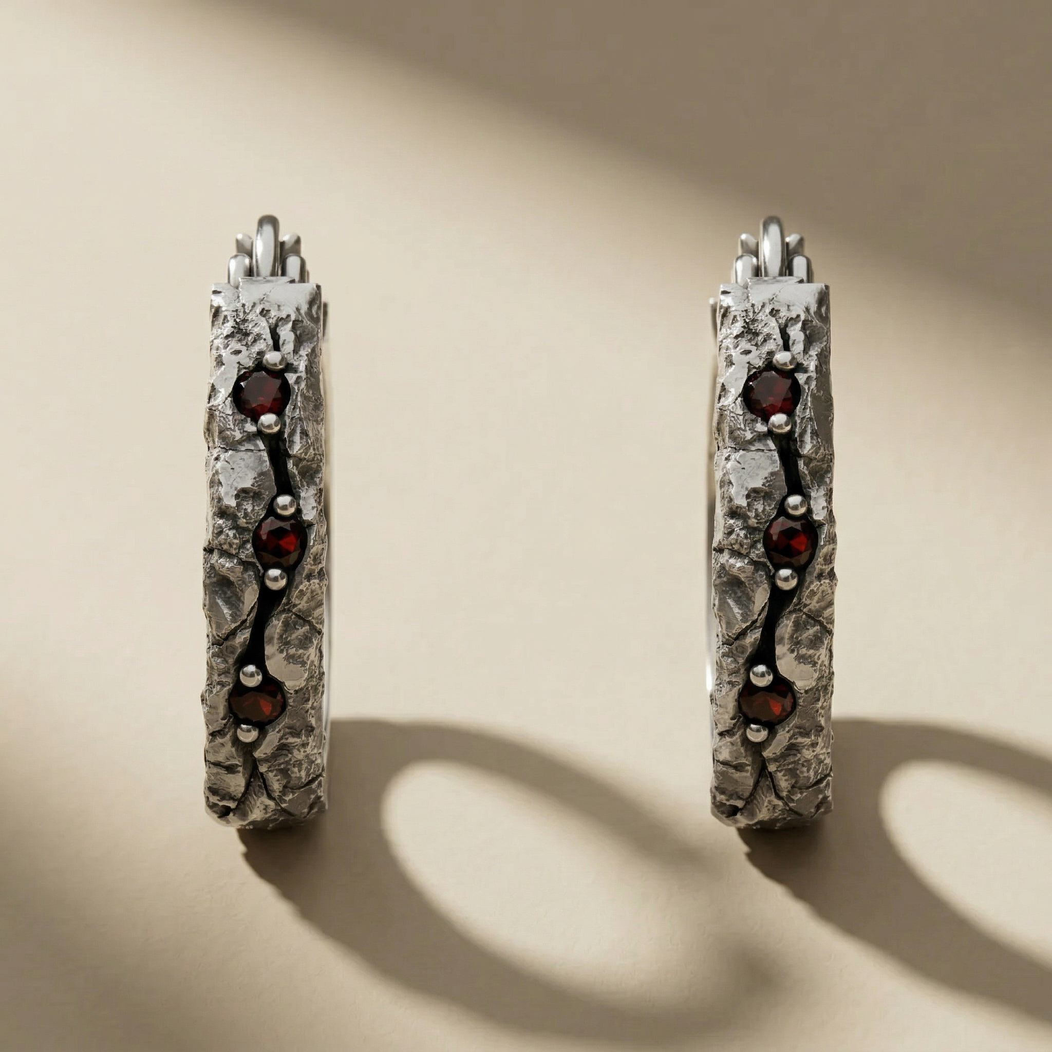 ANULUS hoop earrings in volcanic-oxidized 925 silver, handcrafted in Italy for you - Broken Hearts