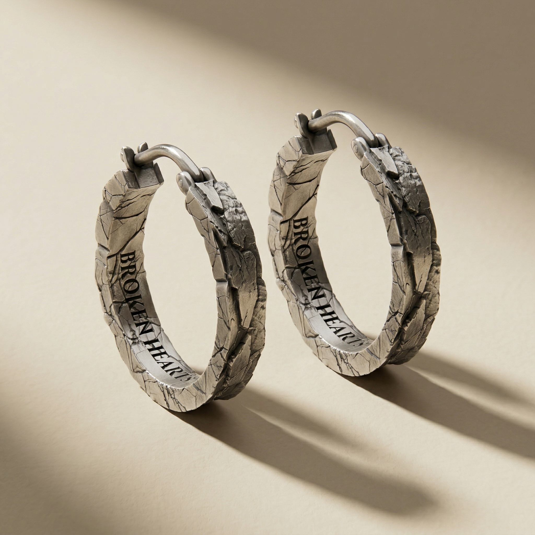 SULNA drop earrings in volcanic-oxidized 925 silver, handcrafted in Italy for you - Broken Hearts