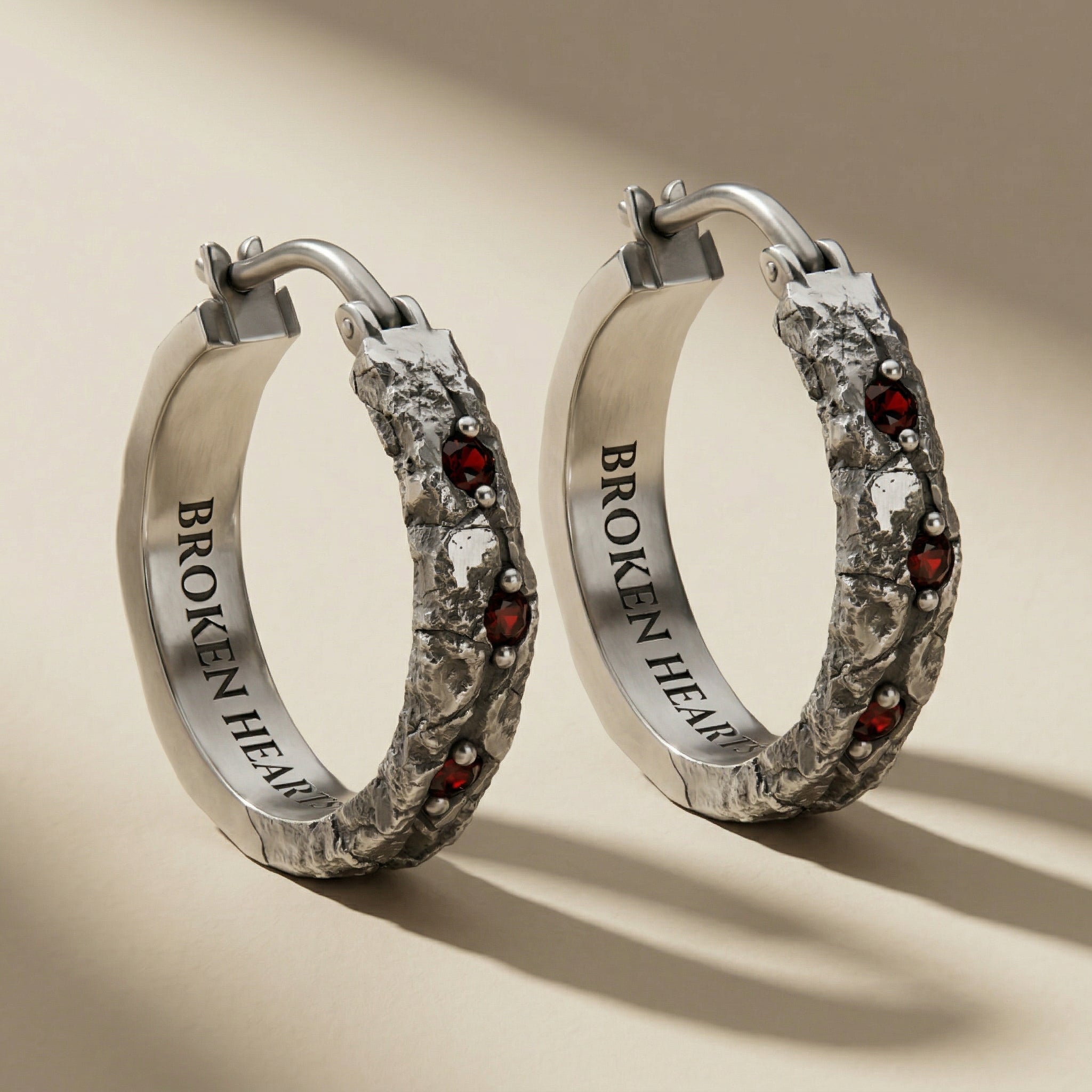 ANULUS hoop earrings in volcanic-oxidized 925 silver, handcrafted in Italy for you - Broken Hearts